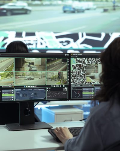 Call center employee providing shipment information via gps satellite navigation for their clients, ensuring fast delivery and order tracking service. Operator monitoring traffic for the couriers.